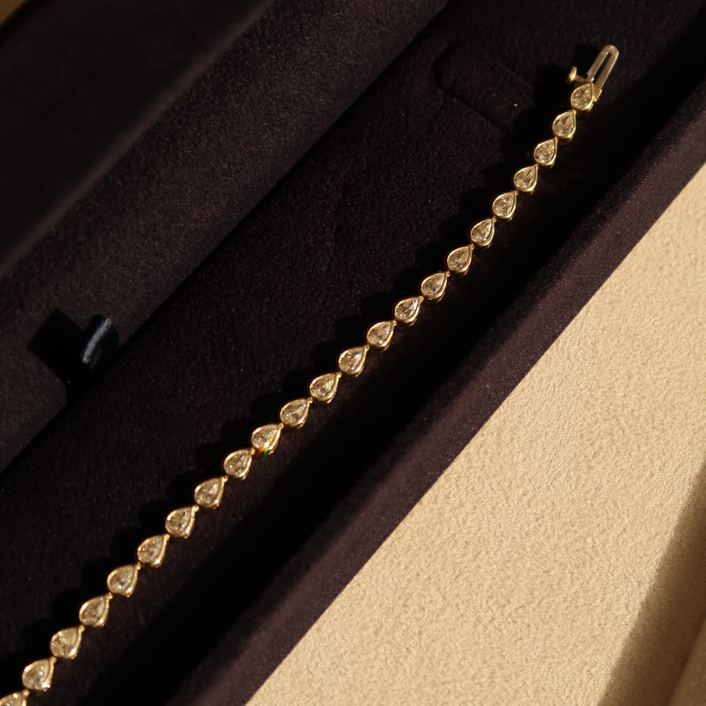 Bezel Pear Tennis Bracelet